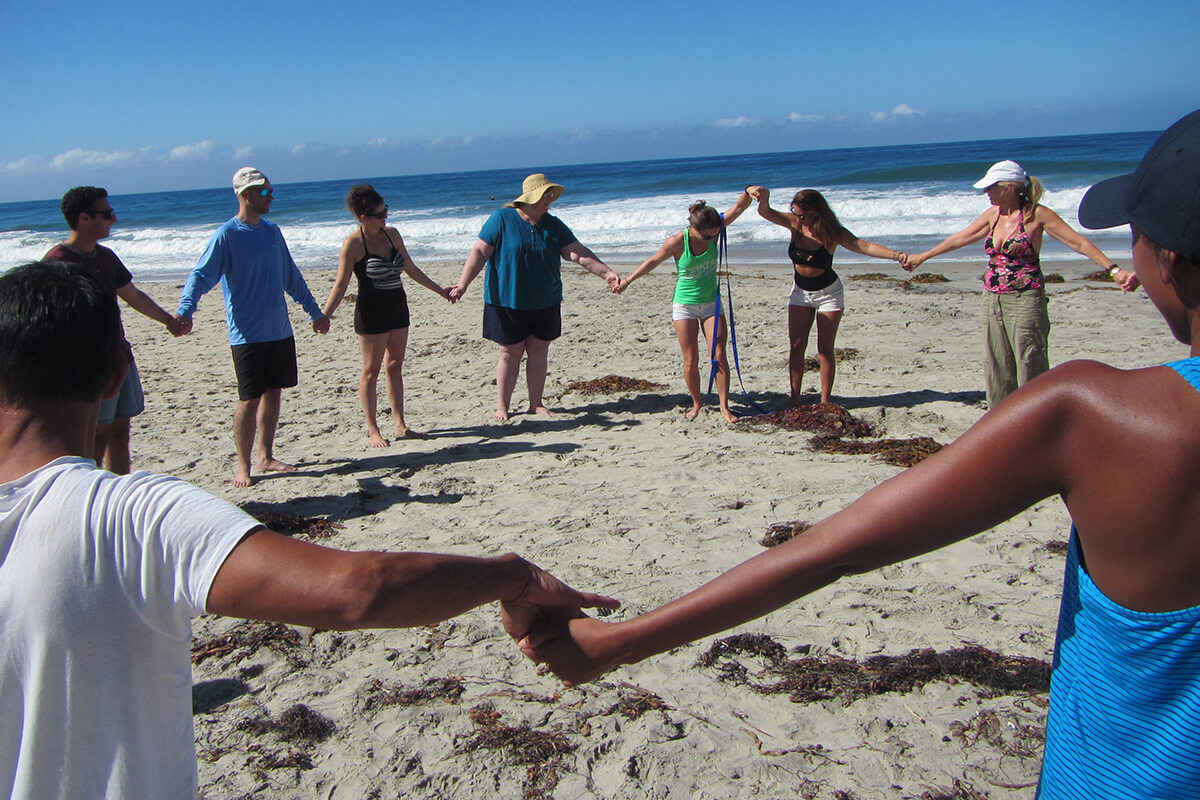 Group team-building activity at beach